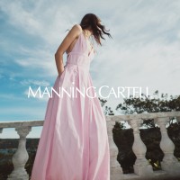MANNING CARTELL logo