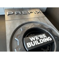 Prefix Corporation logo