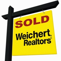 Weichert Realtors-Saxon Clark logo