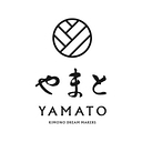 株式会社やまと logo