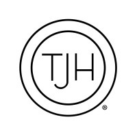 Thomas James Homes logo